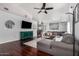 Comfortable living room featuring hardwood floors, comfortable seating, and stylish decor at 960 W Hudson Way, Gilbert, AZ 85233