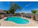 Secluded backyard pool area, highlighted by desert landscaping and comfortable seating, creating a private retreat at 960 W Hudson Way, Gilbert, AZ 85233