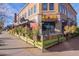 Charming restaurant patio with lush plants, cozy seating, and inviting outdoor dining space at 960 W Hudson Way, Gilbert, AZ 85233