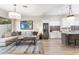 Open-concept living space featuring dining area, kitchen, and a comfortable seating area at 10478 E Sheena Dr, Scottsdale, AZ 85255