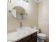 Bright bathroom featuring modern bowl sink, neutral color palette, and brushed nickel fixtures at 1061 E Linda Ln, Gilbert, AZ 85234