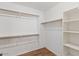 Walk-in closet featuring custom shelving and hanging space at 1061 E Linda Ln, Gilbert, AZ 85234