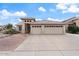 Charming single-story home showcasing a well-maintained front yard and an attached two-car garage at 1061 E Linda Ln, Gilbert, AZ 85234