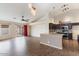 Stylish kitchen with dark cabinets, stainless appliances, and a convenient breakfast bar at 1061 E Linda Ln, Gilbert, AZ 85234
