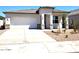Lovely one-story home boasting a two-car garage and drought-resistant landscaping for water conservation at 10612 W Sonrisas St, Tolleson, AZ 85353