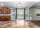 Bright dining area with large windows offering views of the backyard and desert landscape at 12473 W Montgomery Rd, Peoria, AZ 85383