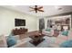 Inviting living room with neutral colors, comfortable seating, and plenty of space for relaxing at 12473 W Montgomery Rd, Peoria, AZ 85383