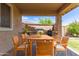 Outdoor dining with a BBQ, and seating; perfect for entertaining friends and Gathering at 12473 W Montgomery Rd, Peoria, AZ 85383