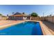 Enjoy a backyard pool in this lovely home, great for relaxation and entertaining at 1316 N Spring Cir, Mesa, AZ 85203