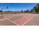 Community basketball court with a hoop and clear blue sky in the background at 13337 W Evans Dr, Surprise, AZ 85379