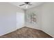 Bedroom featuring neutral walls, carpet, a ceiling fan, and closet at 13337 W Evans Dr, Surprise, AZ 85379