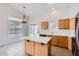 Bright and airy kitchen with an island and plenty of counter space at 13337 W Evans Dr, Surprise, AZ 85379