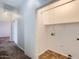 A laundry room featuring a shelf with connections for washer and dryer at 13337 W Evans Dr, Surprise, AZ 85379