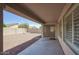 Covered patio overlooks low maintenance backyard at 13414 W Maui Ln, Surprise, AZ 85379