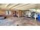 Inviting covered front porch with brick accents and pleasant outdoor space at 1520 W Encanto Blvd, Phoenix, AZ 85007