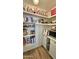 Spacious walk-in pantry offering ample shelving and storage space for all your culinary needs at 1520 W Encanto Blvd, Phoenix, AZ 85007