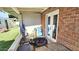 Enclosed patio area with brick siding, offering a private and functional outdoor space at 1520 W Encanto Blvd, Phoenix, AZ 85007