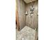 Shower with modern tile, shelving and upgraded fixtures at 1520 W Encanto Blvd, Phoenix, AZ 85007