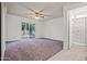 Large main bedroom with sliding glass door access to private patio and en suite bathroom with glass enclosed shower at 16412 N 33Rd Ave, Phoenix, AZ 85053