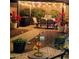 Charming backyard with string lights, outdoor furniture, lush greenery, and vibrant flowers at 16781 S 181St Ln, Goodyear, AZ 85338