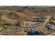 Desert land available to build a home in a luxury community; the lot is surrounded by upscale homes and scenic views at 17837 W Estes Way, Goodyear, AZ 85338