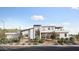 Modern two-story home with desert landscaping, showcasing clean lines and a welcoming entrance at 17837 W Estes Way, Goodyear, AZ 85338