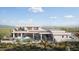 Expansive backyard with a pool, lounge area, and desert landscape, ideal for outdoor living at 17837 W Estes Way, Goodyear, AZ 85338
