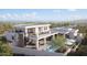 Backyard oasis with pool, covered patio, and rooftop deck overlooking mountain views at 17837 W Estes Way, Goodyear, AZ 85338