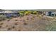 A plot of land in a luxury community is ideal for building a custom home at 17837 W Estes Way, Goodyear, AZ 85338