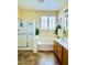 Bathroom with garden tub, glass shower, double vanity, and neutral decor at 17840 N Smith Dr, Maricopa, AZ 85139