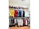 Organized walk-in closet featuring shelving and rods for clothing and accessories at 17840 N Smith Dr, Maricopa, AZ 85139