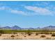 Wide shot of distant mountains across a landscape, emphasizing the area's natural beauty and surroundings at 17840 N Smith Dr, Maricopa, AZ 85139