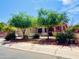 Charming single-Gathering home features a three-car garage and desert landscaping at 17840 N Smith Dr, Maricopa, AZ 85139