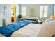 Bright main bedroom with sofa sitting area and access to the en suite bathroom at 17840 N Smith Dr, Maricopa, AZ 85139