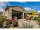 Stunning outdoor living space with a fire pit, built-in grill, and beautiful landscaping at 1813 N Trowbridge --, Mesa, AZ 85207
