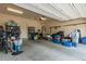 Spacious garage filled with organized storage, household items and room for parking at 1813 N Trowbridge --, Mesa, AZ 85207