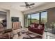 Enjoy this comfortable living room with a sliding glass door to a private patio and outdoor seating at 1813 N Trowbridge --, Mesa, AZ 85207