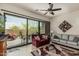 Relax in this inviting living room with access to a private patio and desert views at 1813 N Trowbridge --, Mesa, AZ 85207
