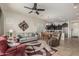 Bright, open-concept living space boasts tile floors and connects seamlessly to the kitchen at 1813 N Trowbridge --, Mesa, AZ 85207
