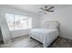 Bright bedroom with a ceiling fan and a large window at 1825 W Ray Rd # 2074, Chandler, AZ 85224