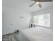 Well lit bedroom featuring a ceiling fan and window at 1825 W Ray Rd # 2074, Chandler, AZ 85224