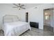 Clean bedroom featuring a ceiling fan and access to the bathroom at 1825 W Ray Rd # 2074, Chandler, AZ 85224