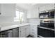 Bright kitchen boasts modern appliances and a window with a view at 1825 W Ray Rd # 2074, Chandler, AZ 85224