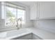 Well-lit kitchen sink with a view from the window at 1825 W Ray Rd # 2074, Chandler, AZ 85224