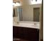 Bathroom vanity features dual sinks, ample cabinet space and a large mirror at 1867 S Seton Ave, Gilbert, AZ 85295