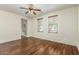 Bright bedroom with two windows and wood-look flooring at 1867 S Seton Ave, Gilbert, AZ 85295