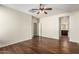 Spacious bedroom features wood-look flooring and a ceiling fan at 1867 S Seton Ave, Gilbert, AZ 85295
