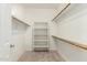 Walk-in closet with shelving and carpeted floors at 1867 S Seton Ave, Gilbert, AZ 85295