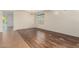 Spacious living room featuring beautiful hardwood floors and bright natural light at 1867 S Seton Ave, Gilbert, AZ 85295