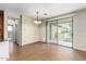 Open dining space with sliding glass doors offering natural light and access to outdoor at 1867 S Seton Ave, Gilbert, AZ 85295